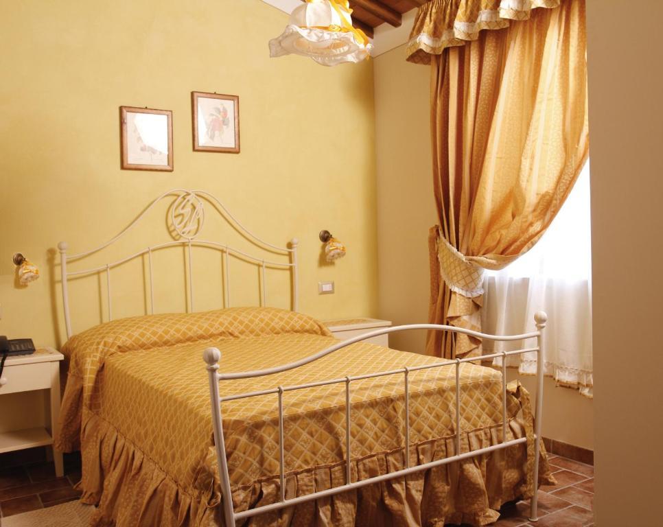 Agriturismo San Lorenzo Serre Di Rapolano Zimmer foto